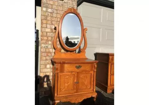 Fancy Victorian style oak vanity washstand dresser with mirror for a bedroom or bathroom